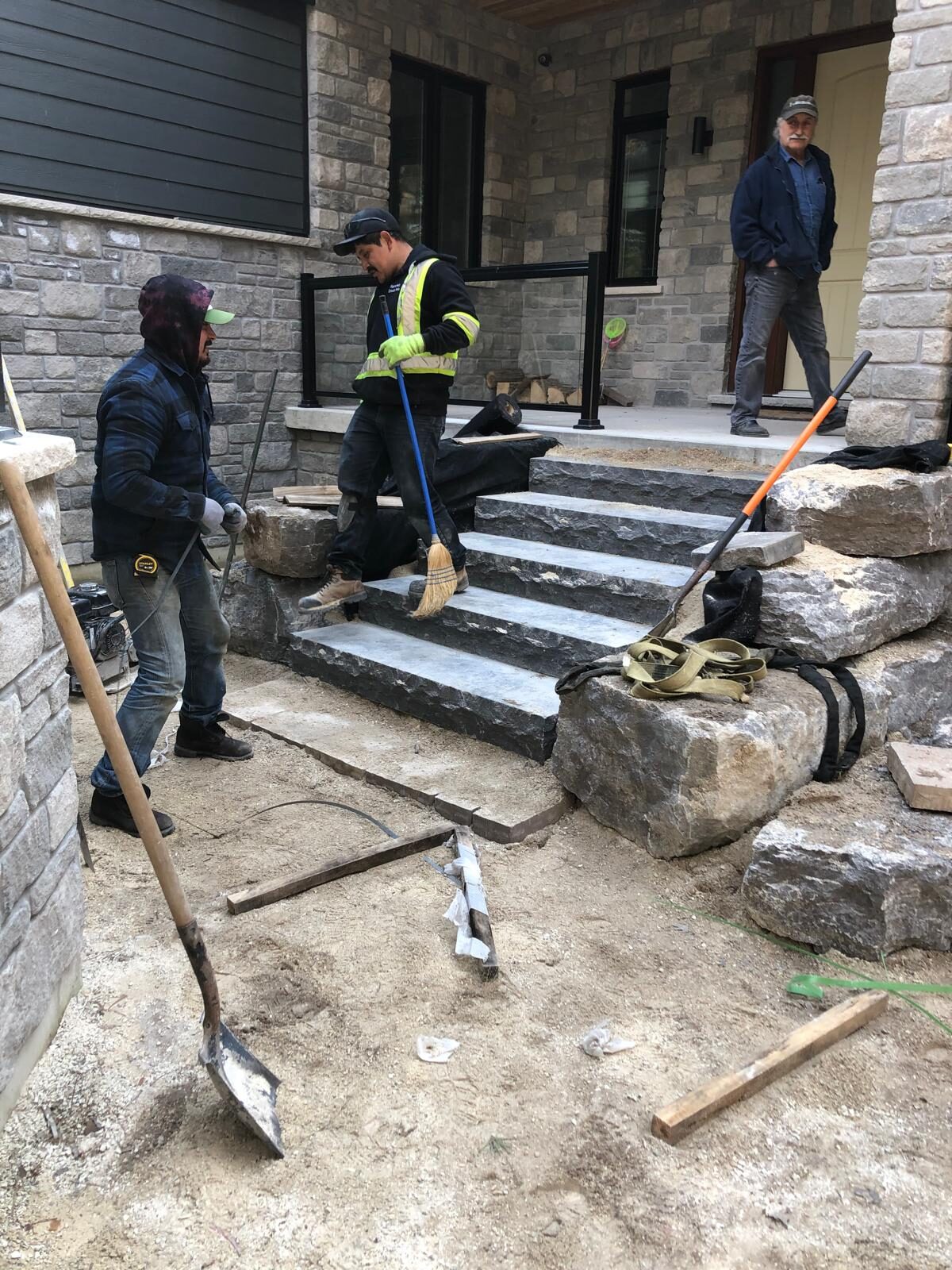 Natural stone entrance stairs under construction in the Greater Toronto Area