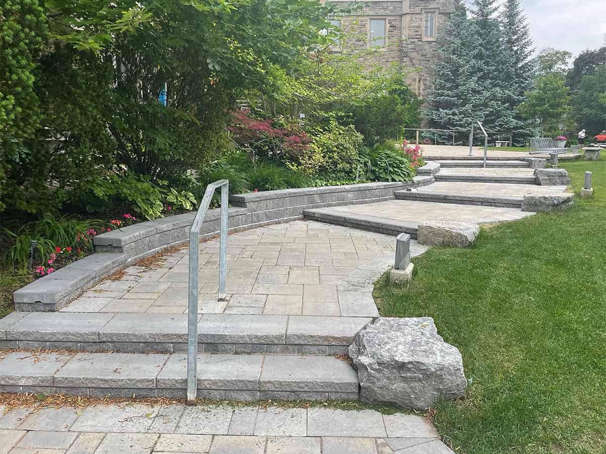 Interlocking walkway, steps and retaining wall installation