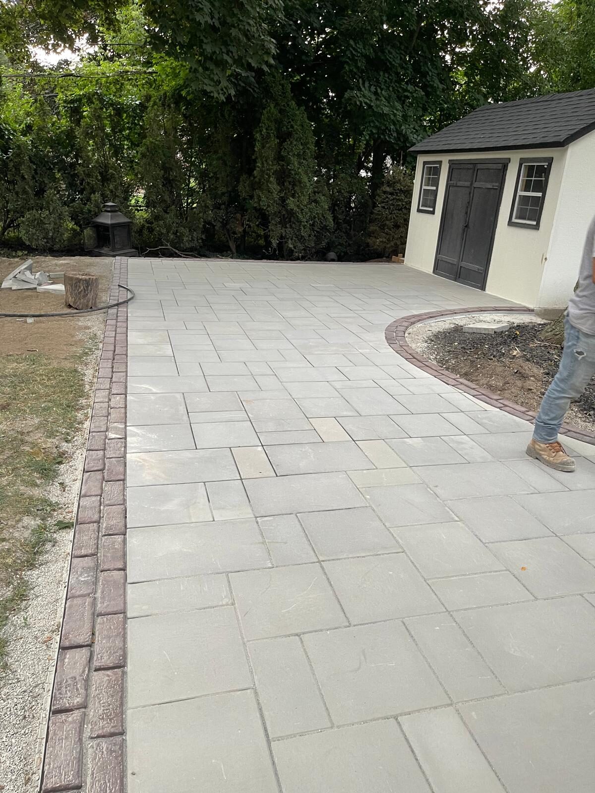 Interlocking paver patio and backyard hardscaping built by Ramirez Landscaping in Vaughan, ON