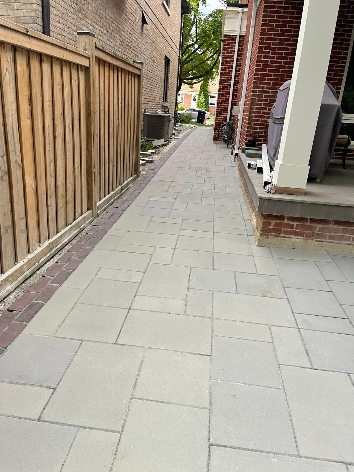 Interlocking paver driveway installed by Ramirez Landscaping in Toronto, ON