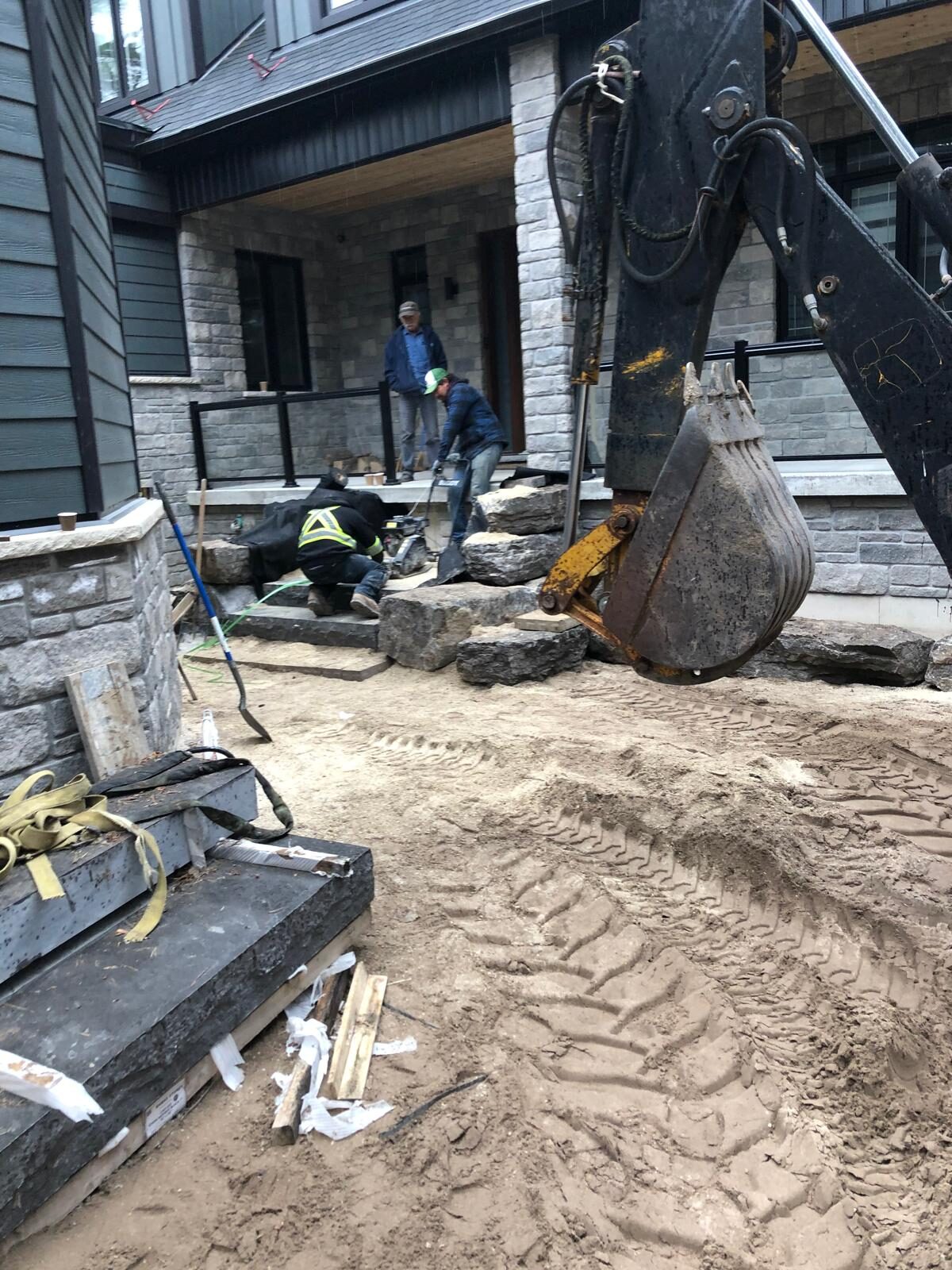 Natural stone entrance stairs under construction in the Greater Toronto Area