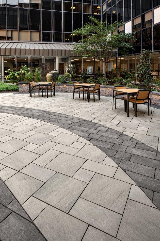Modern interlocking patio with seating at a commercial courtyard