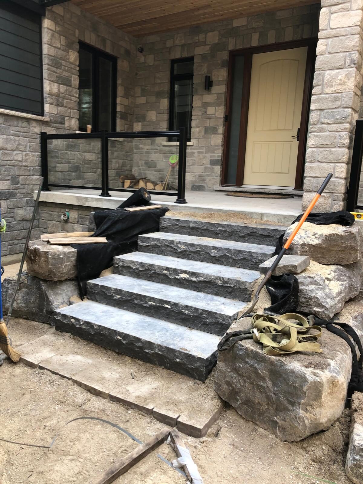 Completed natural stone front steps built by Ramirez Landscaping in Toronto, ON