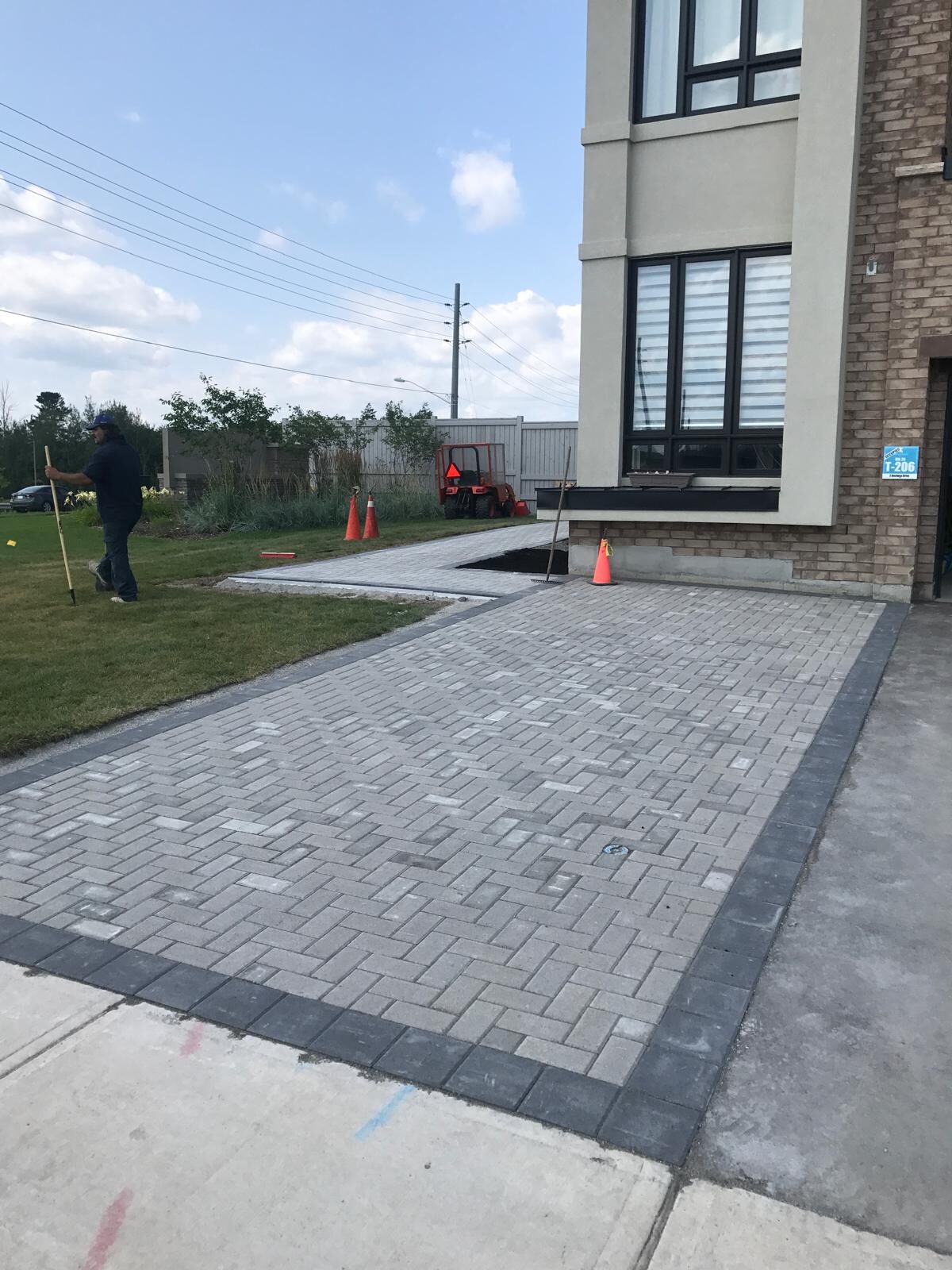 Interlocking paver driveway installed by Ramirez Landscaping in Toronto, ON