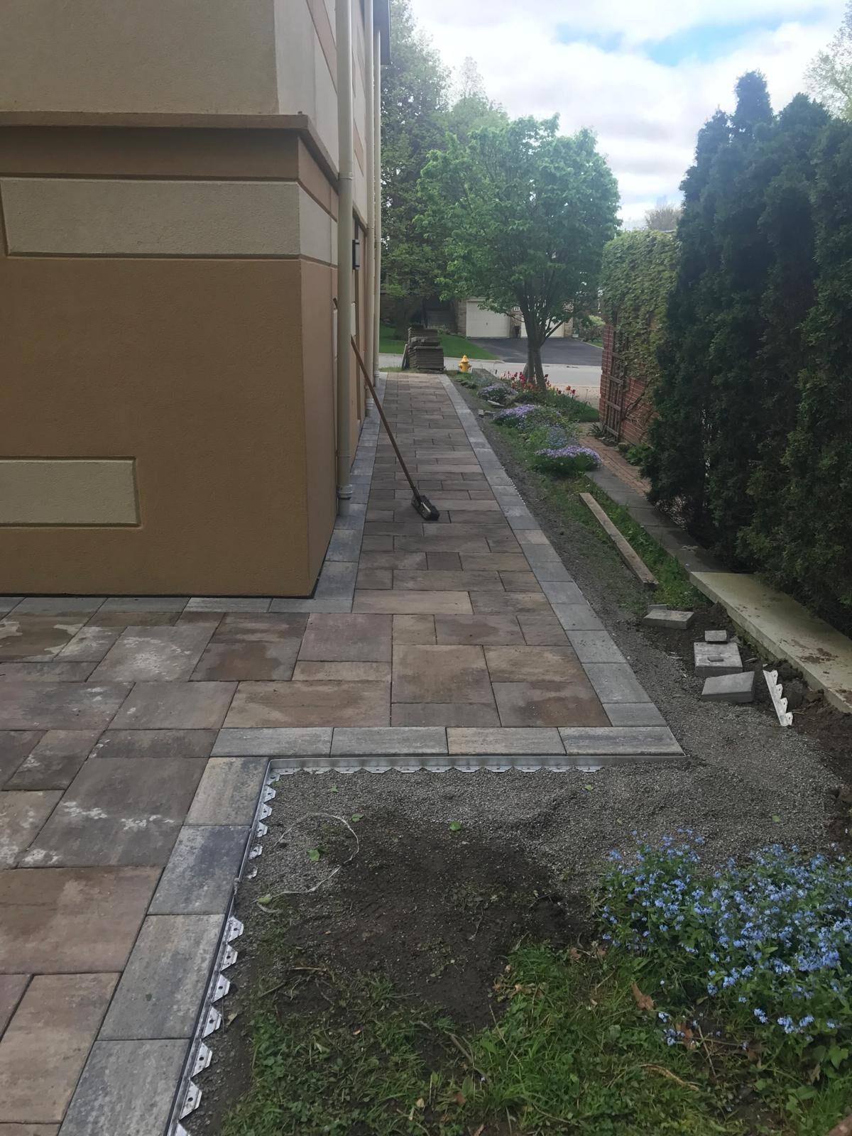Interlocking paver patio and backyard hardscaping built by Ramirez Landscaping in Vaughan, ON