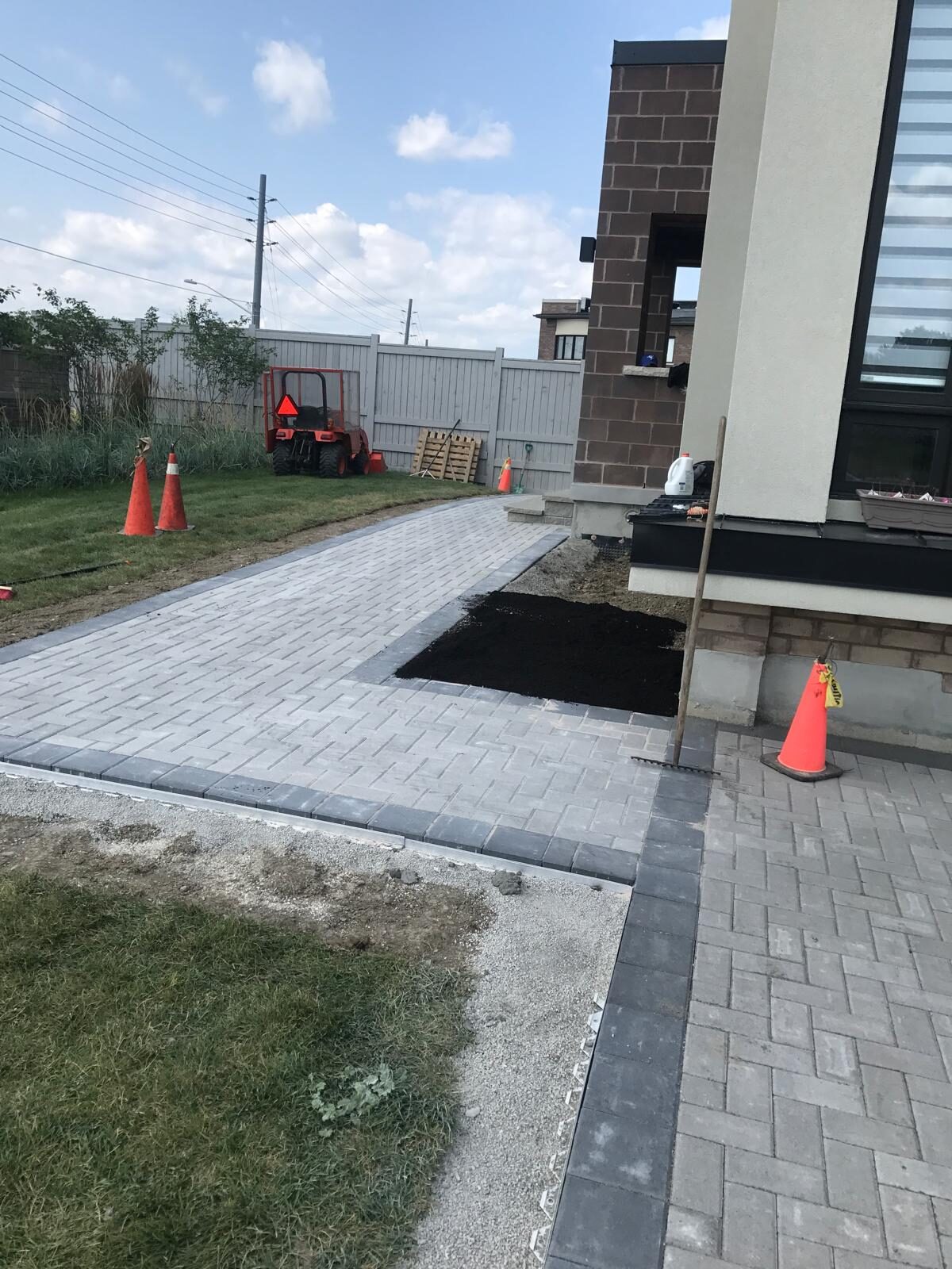 Interlocking paver patio and backyard hardscaping built by Ramirez Landscaping in Vaughan, ON