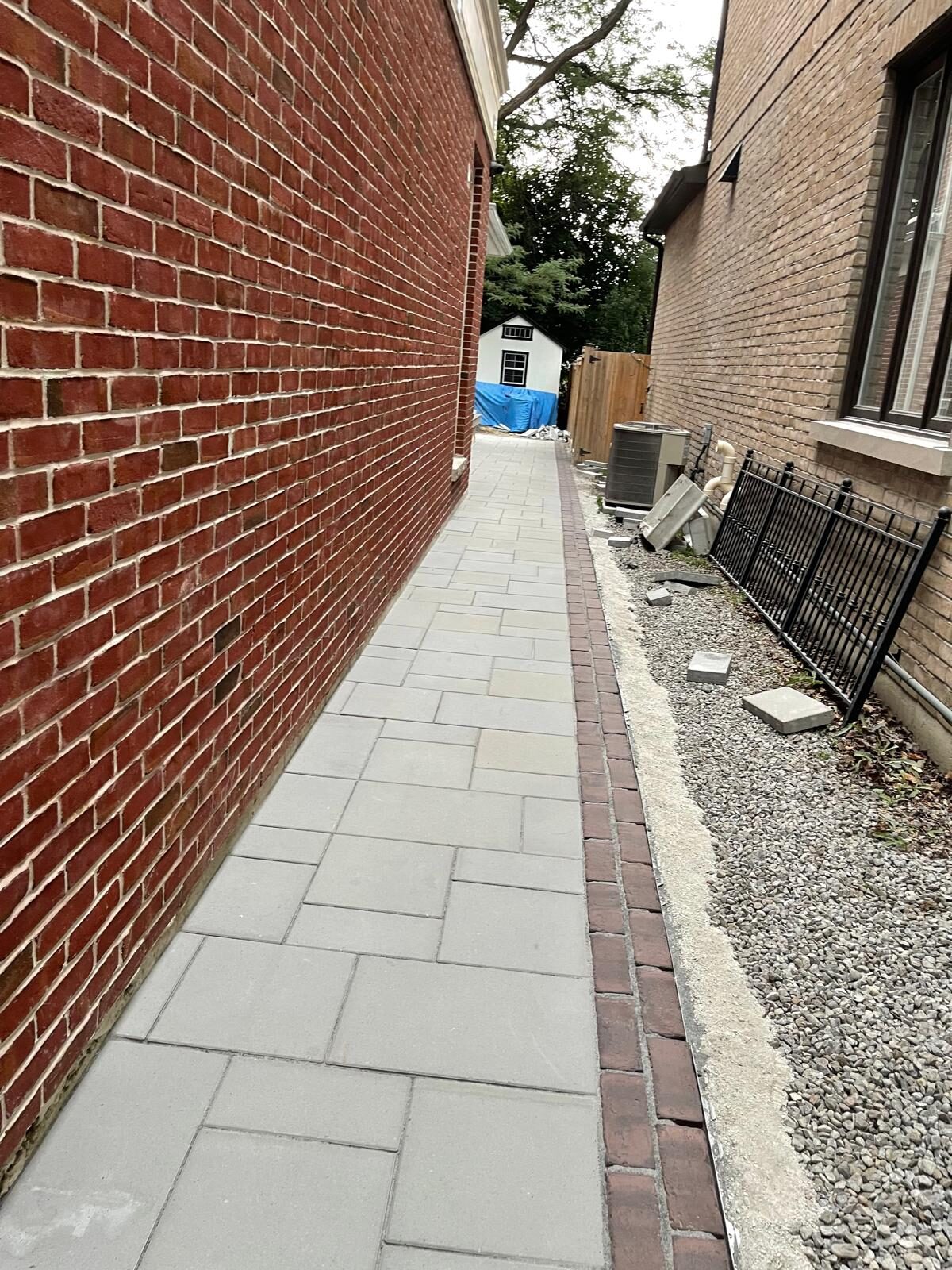 Interlocking paver driveway installed by Ramirez Landscaping in Toronto, ON