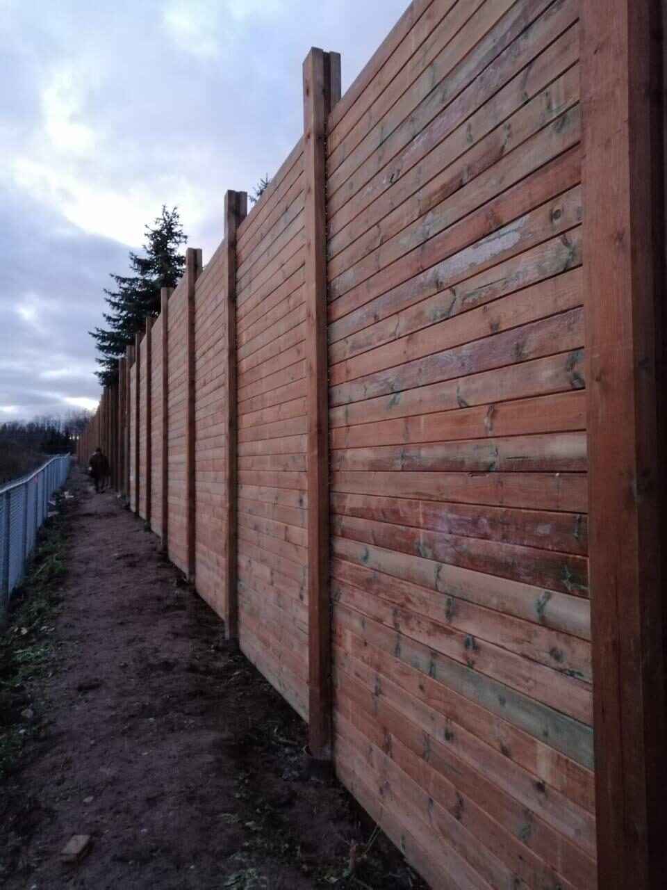 Completed cedar wood privacy fence installed by Ramirez Landscaping in Etobicoke, ON