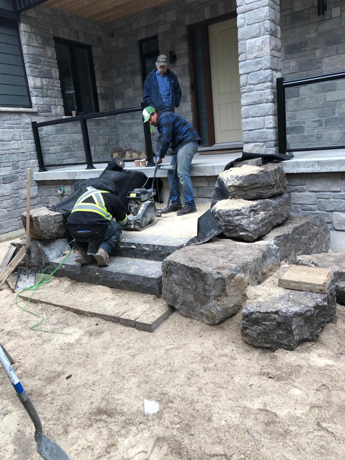 Natural stone entrance stairs under construction in the Greater Toronto Area